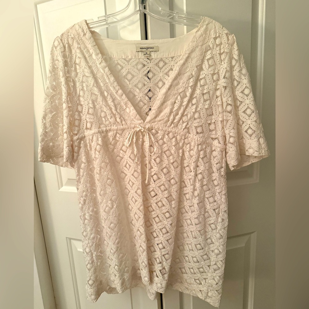 White eyelet blouse by Banana Republic 
Medium